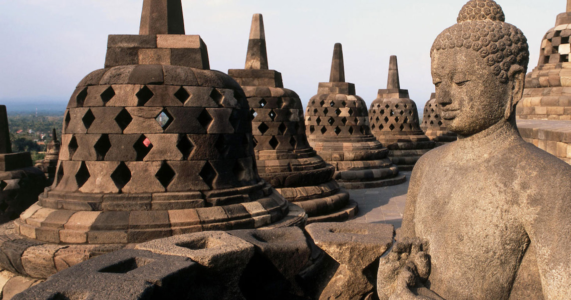 Stone stupas at Borobudur temple in Indonesia